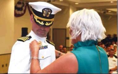 Left: Capt. Chris Jason assumed command of NASCC during a change of command ceremony held at the station’s Catalina Club, July 31.