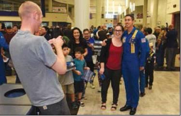 Left: The public was able to meet the Blue Angels and other performers during an open house held at Veterans Memorial High School, April 12.